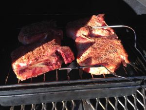 Place your pork loin chops on your smoker cooker