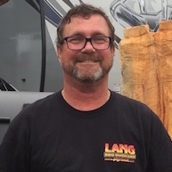 Darryl Strickland instructing smoker cooker classes on Lang BBQ Smokers